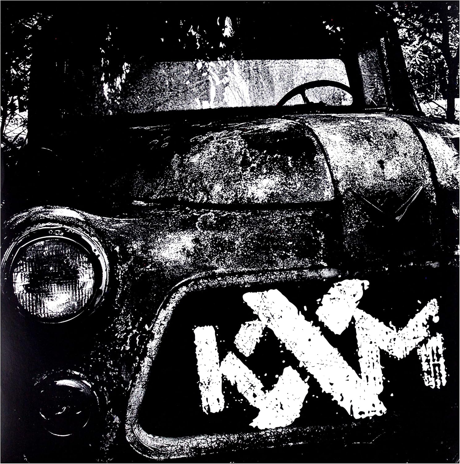 KXM – S/T